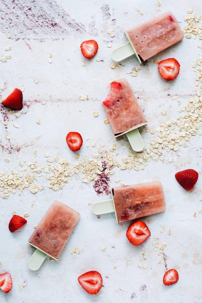 strawberry slices with oats and popsicles