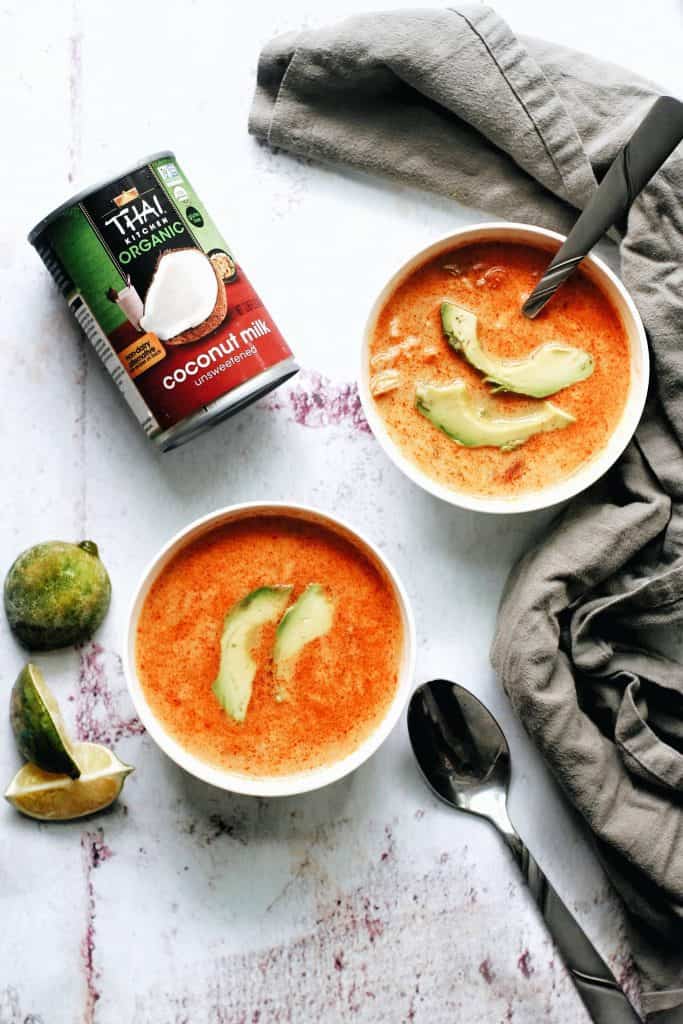 2 bowls of chili with avocados and thai kitchen coconut milk