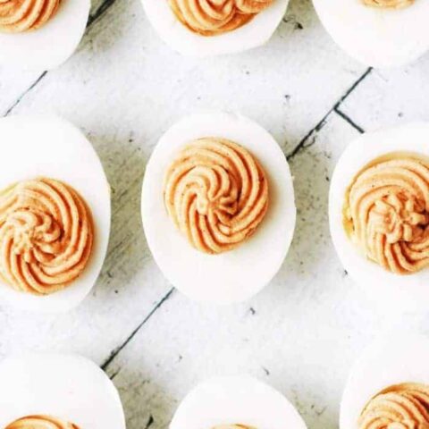 over head shot of 9 deviled eggs neatly lined up