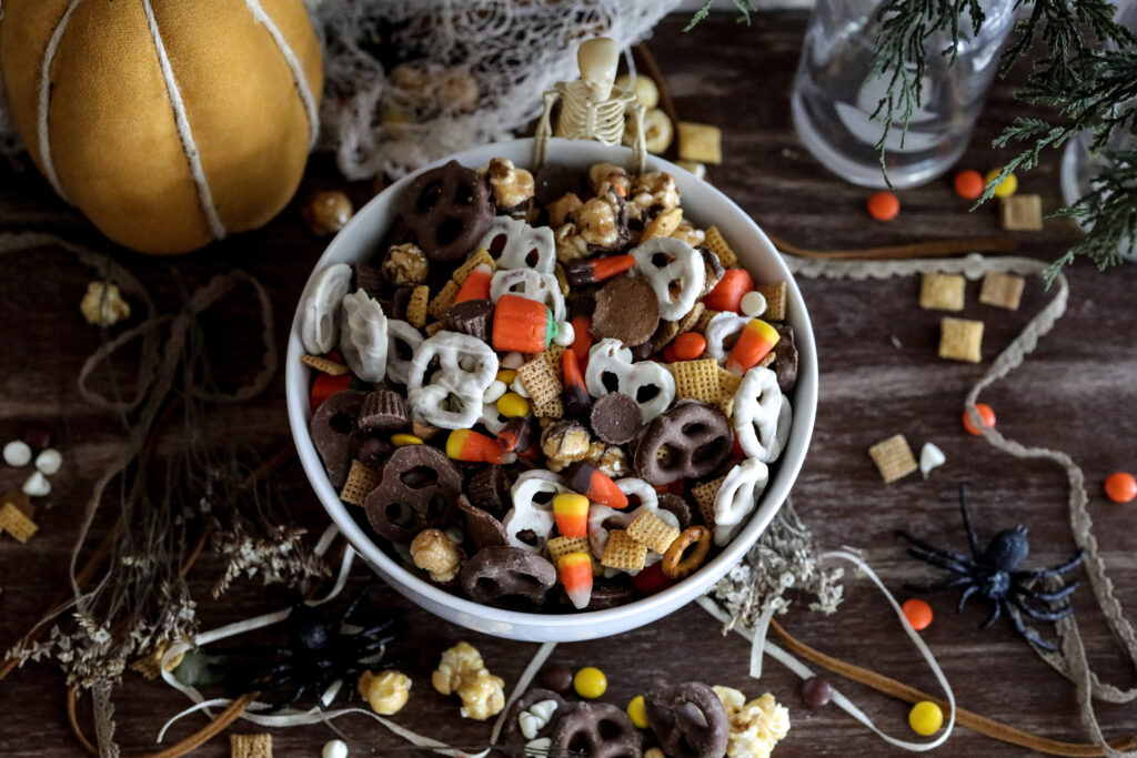 horizonal top view of trail mix in a white bowl 